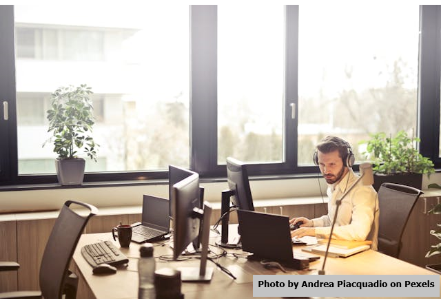 A man in a call center working.